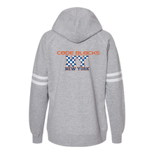 Load image into Gallery viewer, J. America 8645 Women's Varsity Fleece Piped Hooded Sweatshirt
